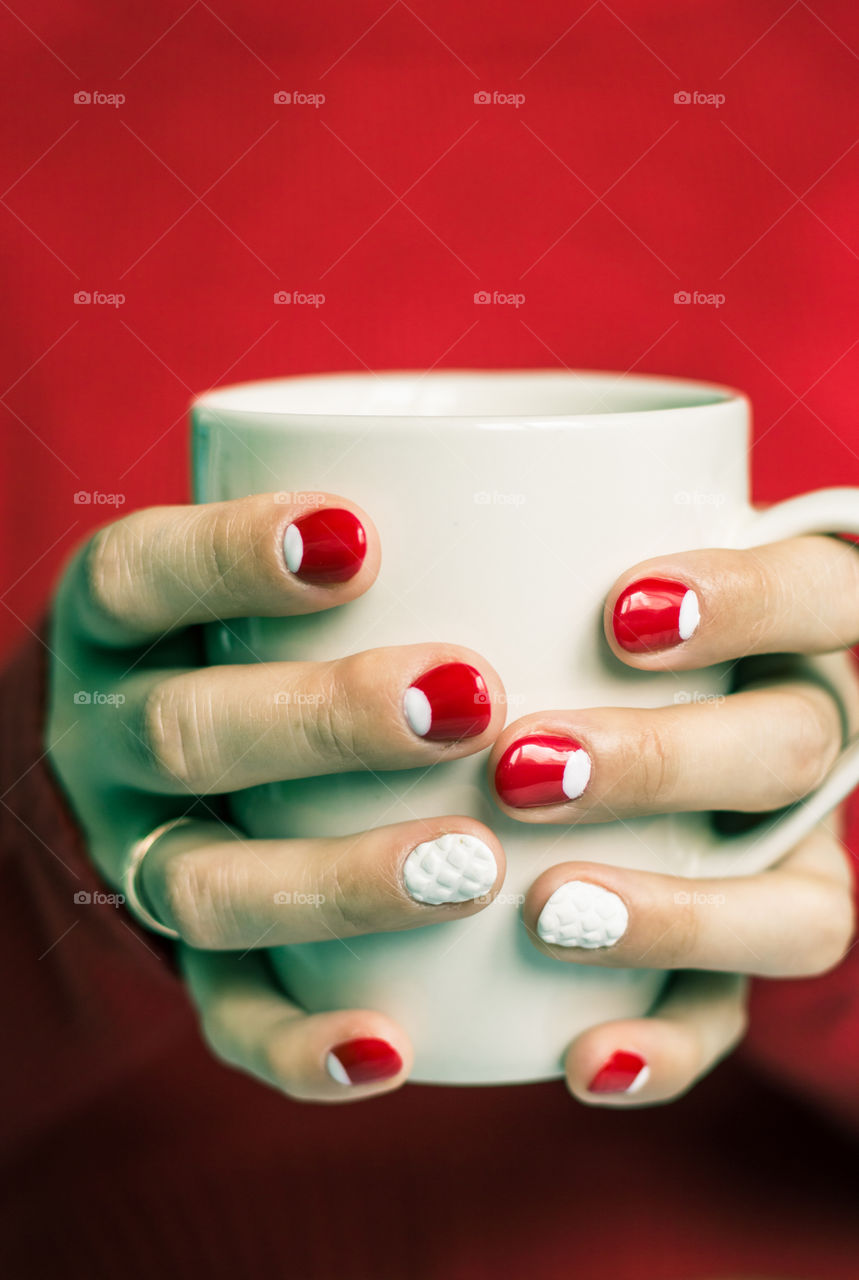 woman hand with cup of tea