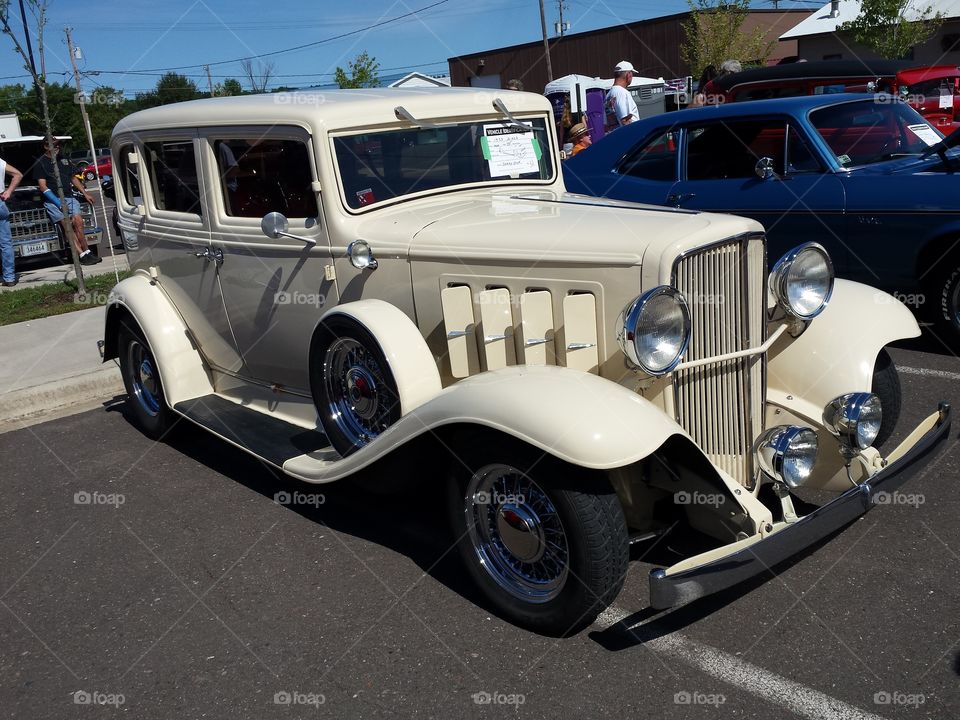 White antique car. Labor day car show 2015