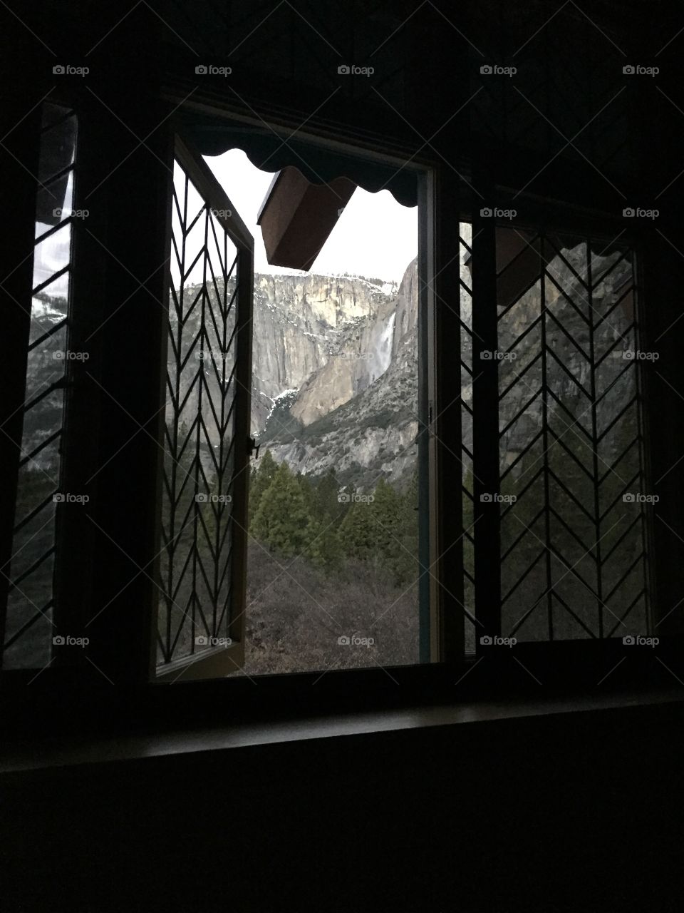 A glimpse of natural beauty through a window in Yosemite in winter.