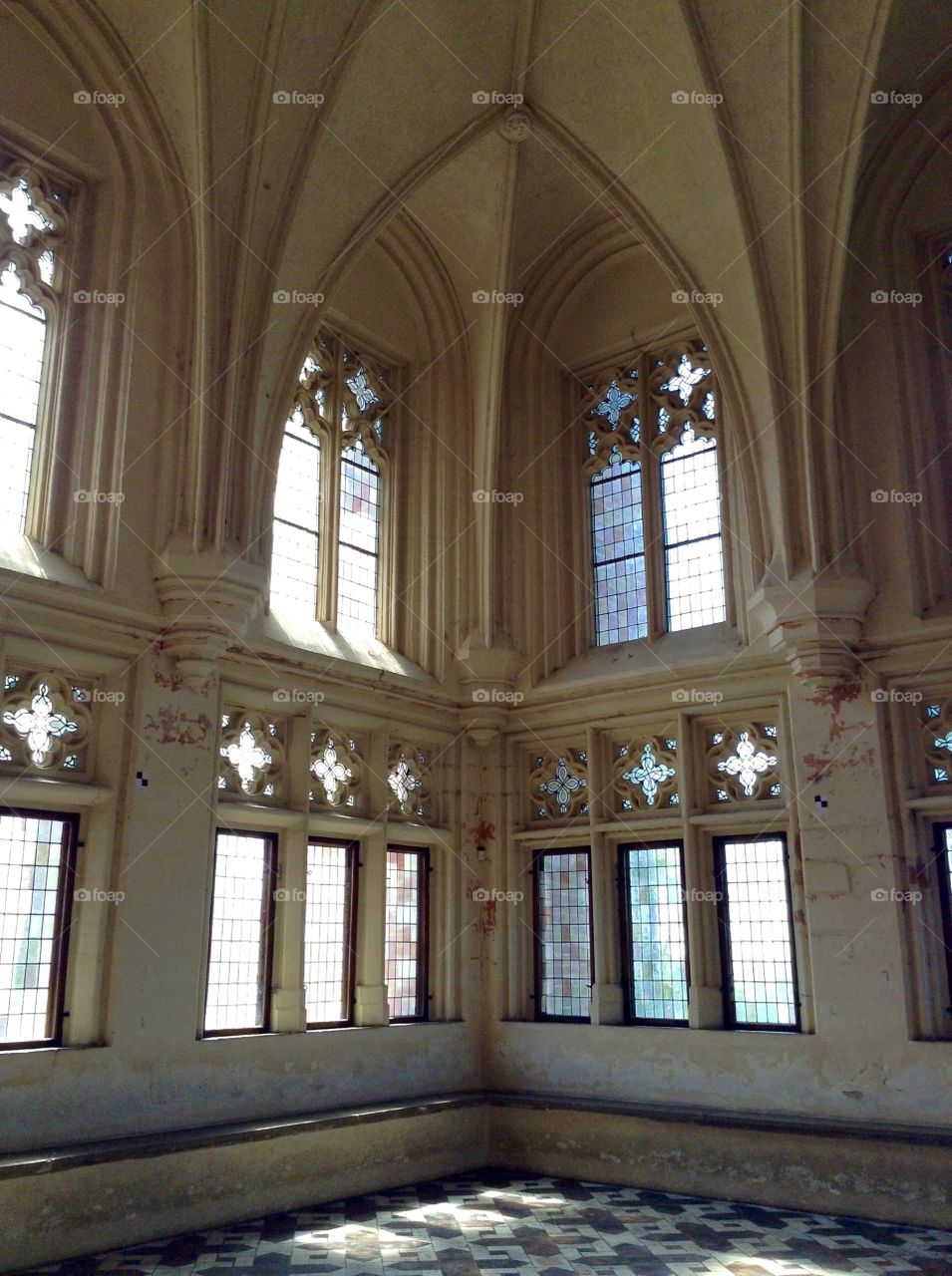 Stained glass windows in the corner of Malbork castle summer hall