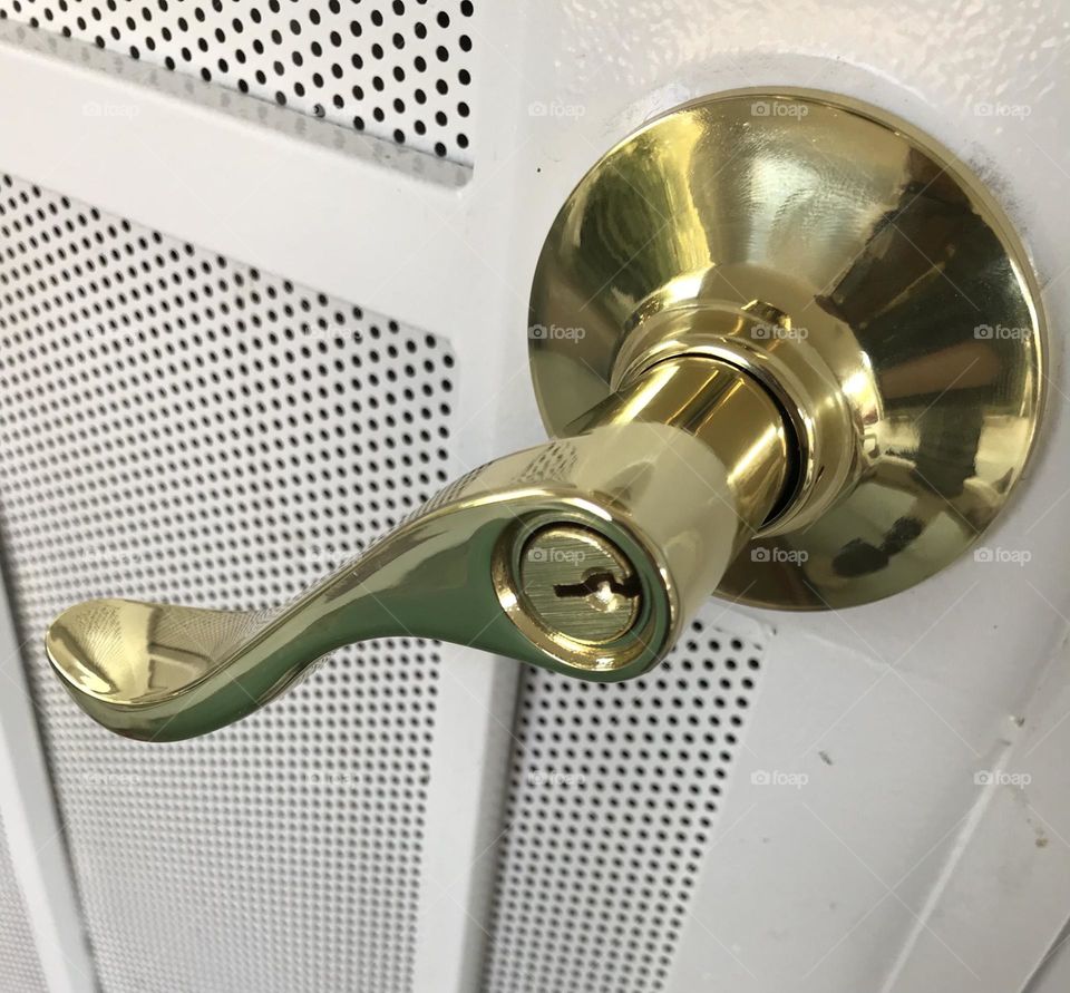 A newly installed door lever handle.