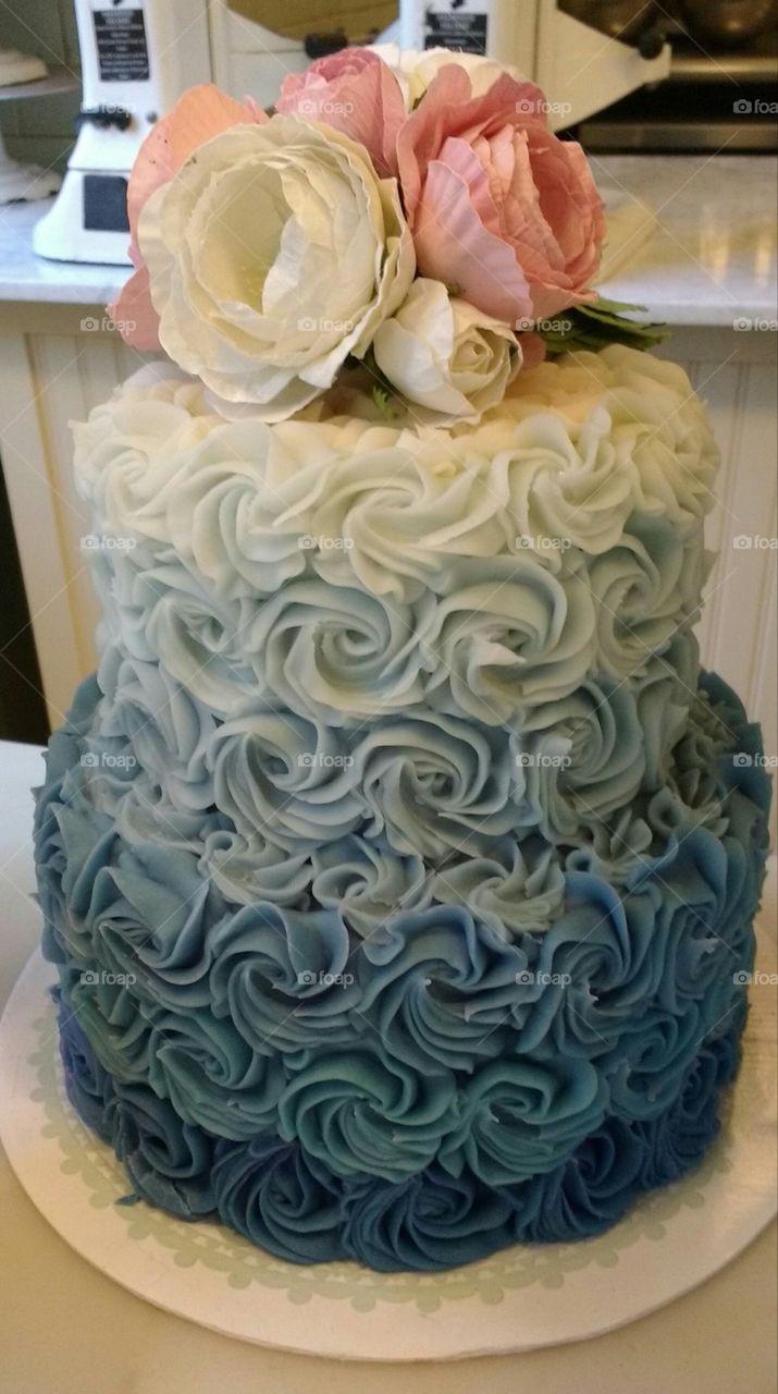 Blue Cake with Flowers on Top