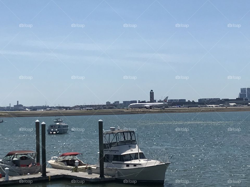 Boat,pier,water,ocean,skyline,