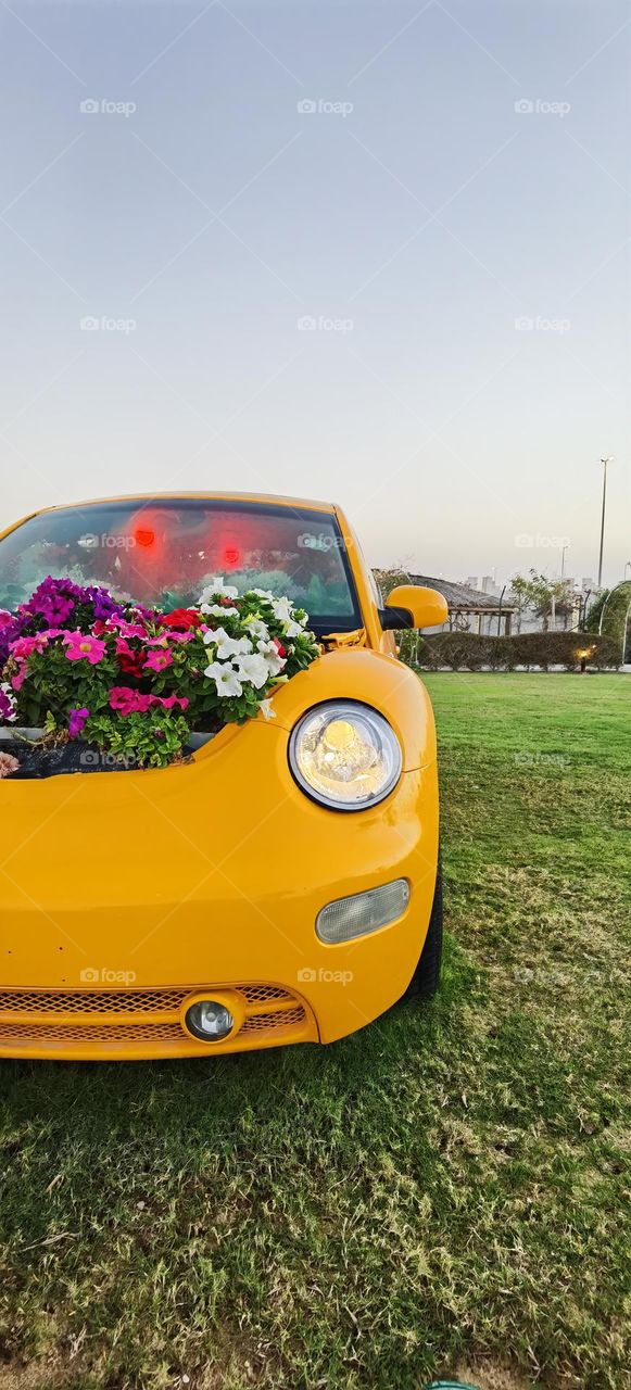 Yellow car with flowers