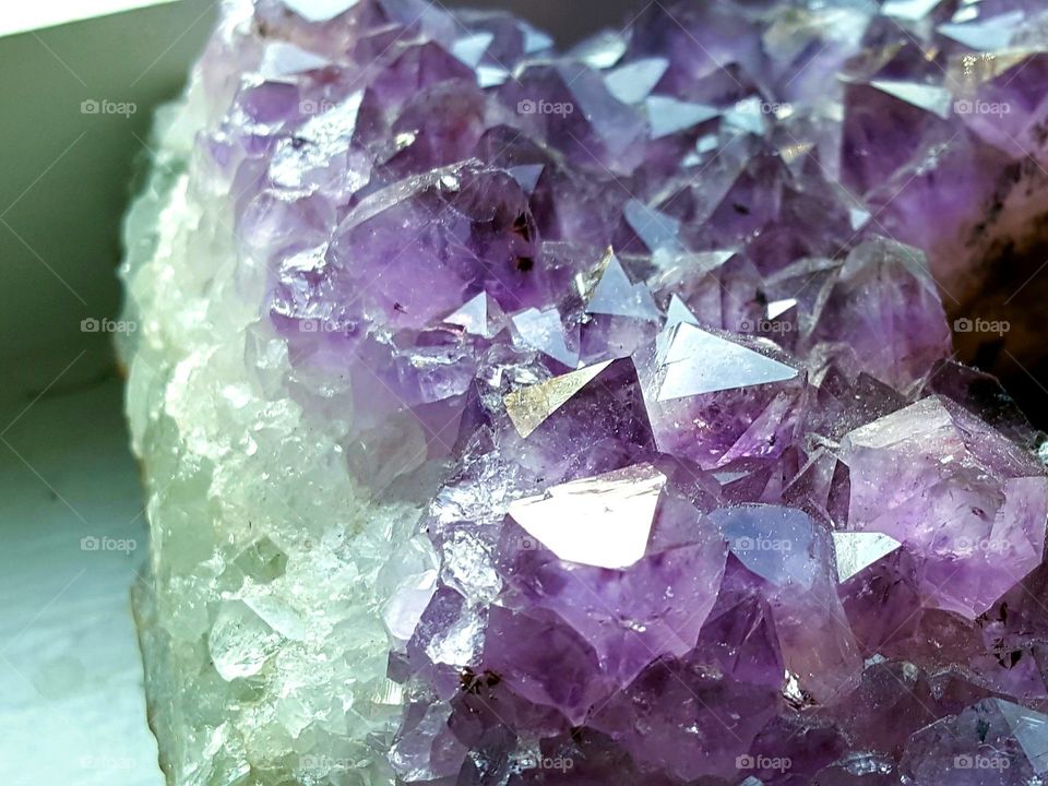Close shot of a purple amethyst cluster.