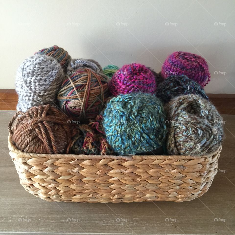 Multi colored yarn in basket