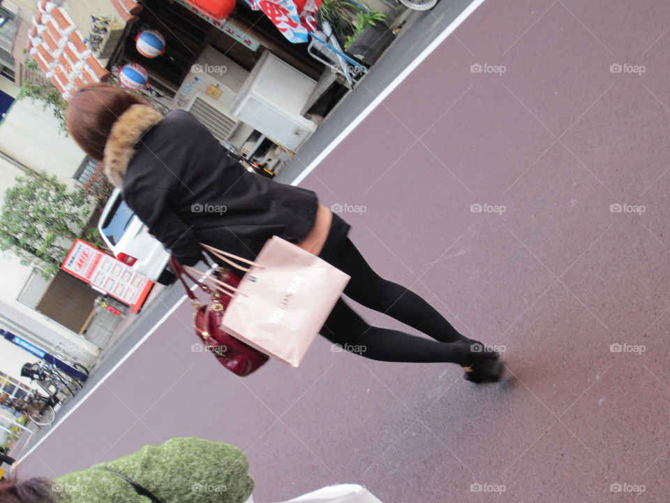 Fashionable Japanese Woman with Shopping Bags