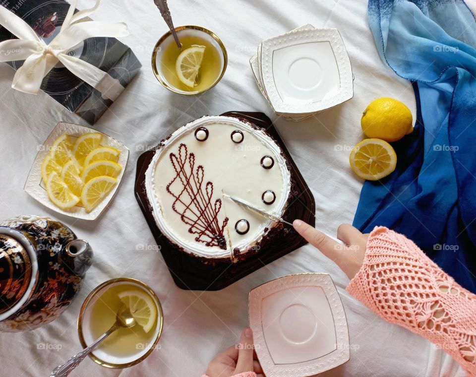 composition tea with cake, tea with lemon,