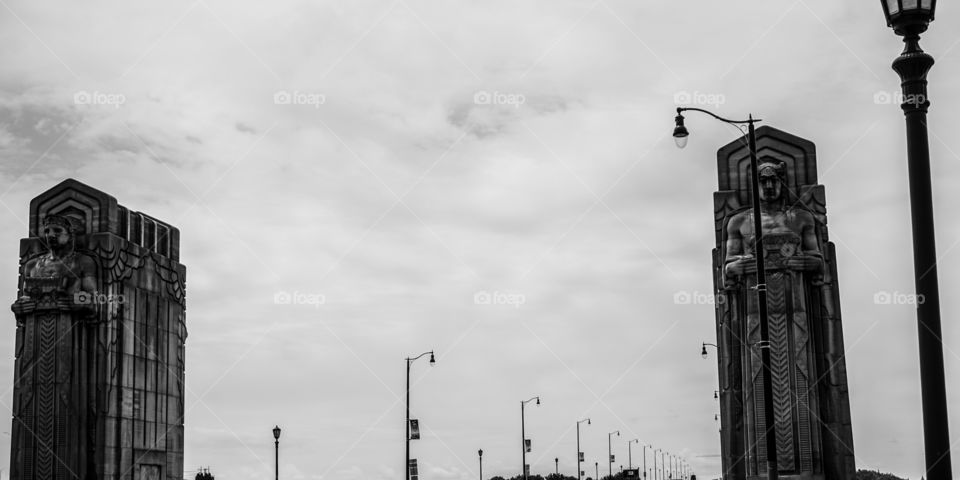 Statues and lights on bridge