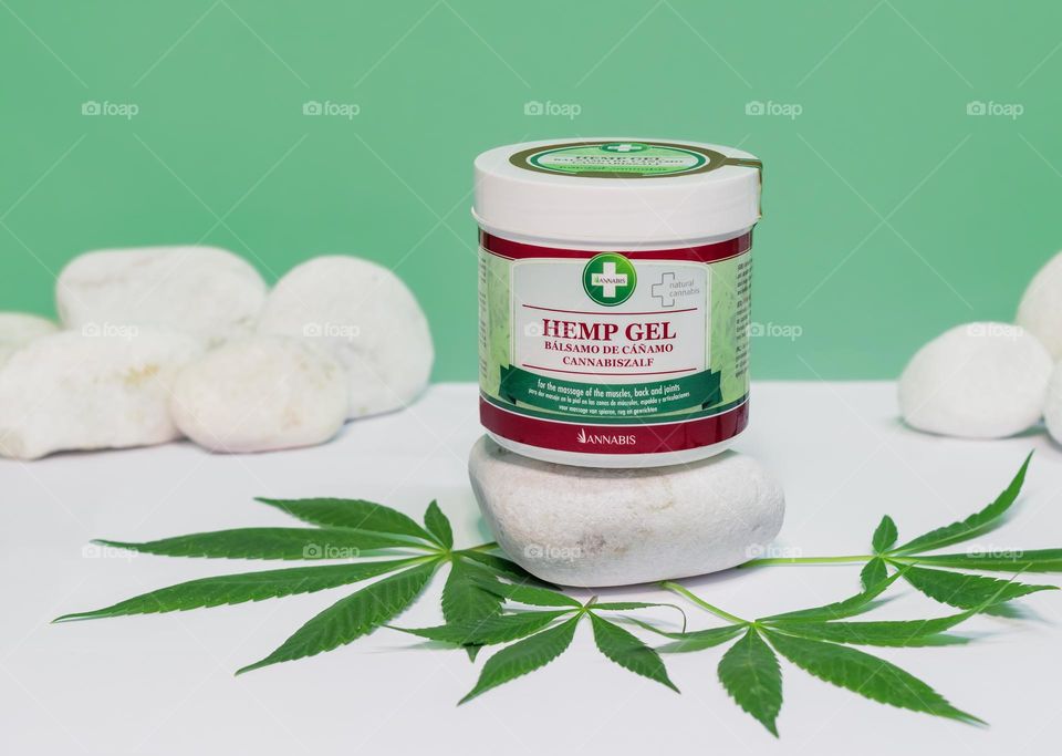 Annabis Hemp Gel displayed with cannabis leaves in a green and white setting