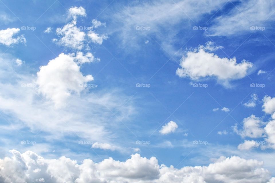 Blue sky and clouds in the morning.  Beautiful summer sky.