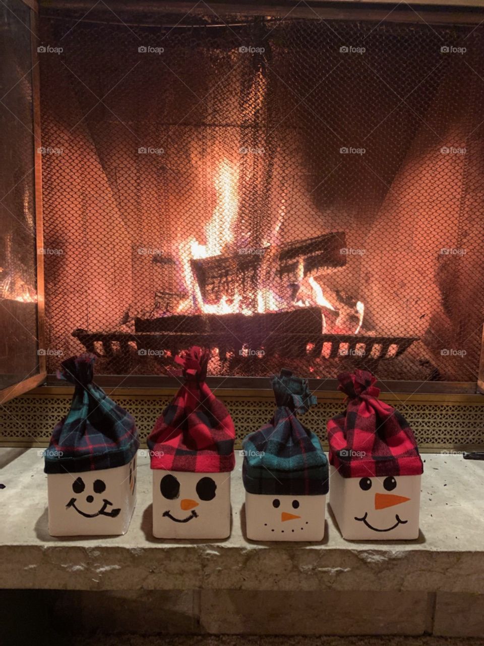 The warm fire is definitely my ideal winter activity, but painting snowman wood blocks was a ton of fun too.