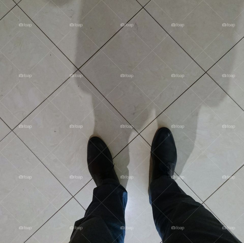 silhouette and shadow on the floor lines