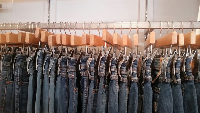 unisex clothing. jeans waiting for their owners