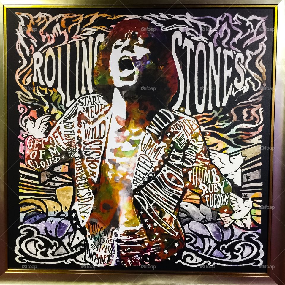 Rolling Stones poster with splashes of vibrant colour
