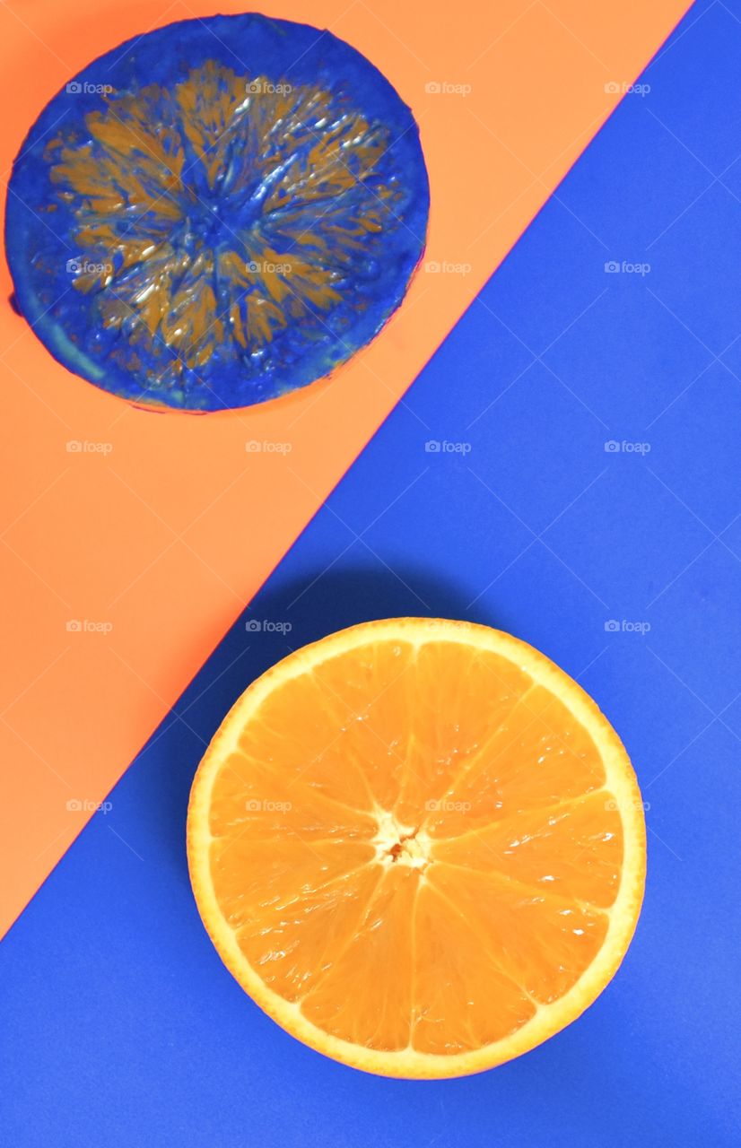 Orange and blue, side by side diagonal orange and orange painted blue