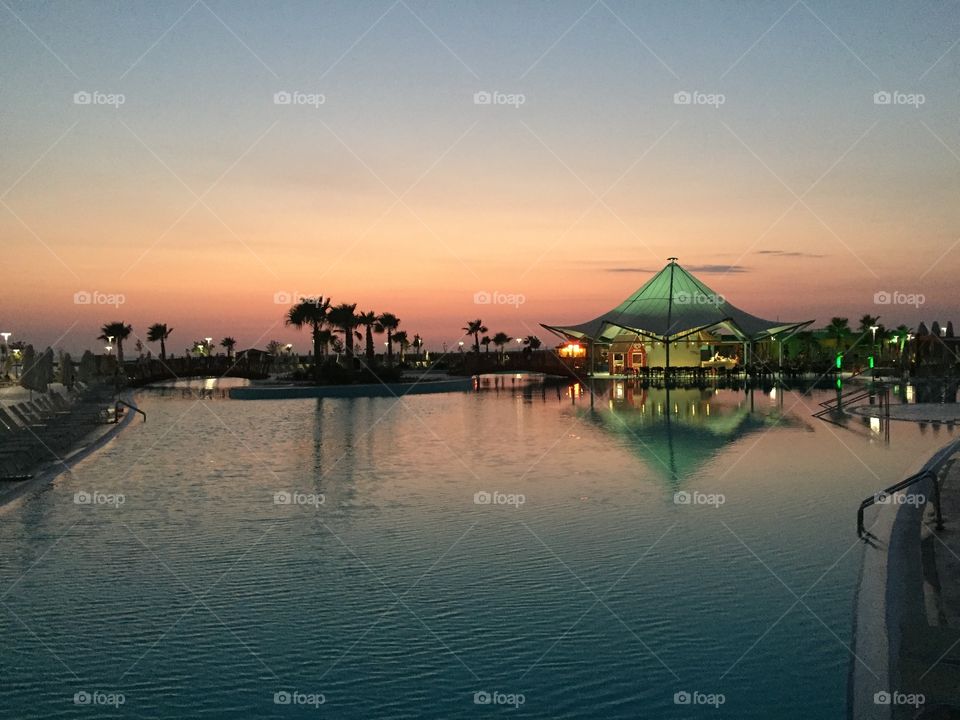 Sunset by the pool