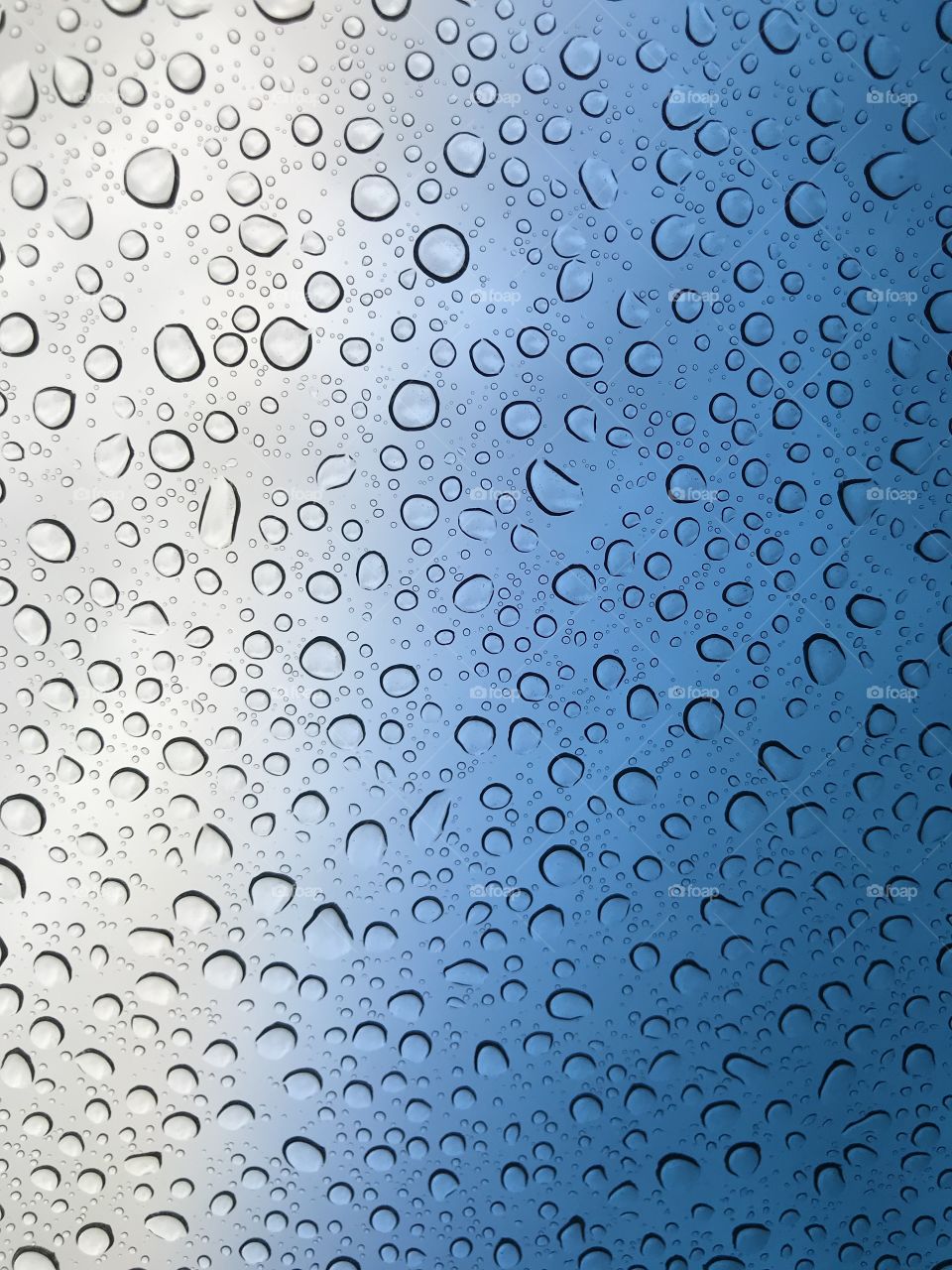 Silver and blue rain drops