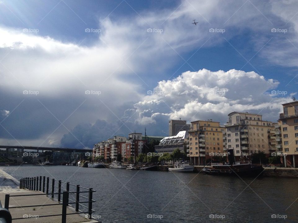 Thunder clouds, lake, sky, boats, Stockholm