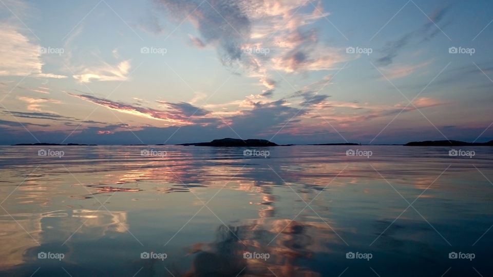 Clouds reflecting on sea