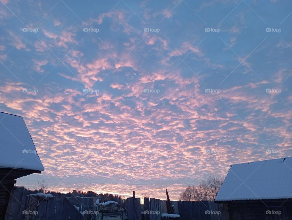 frosty morning and snow clouds
