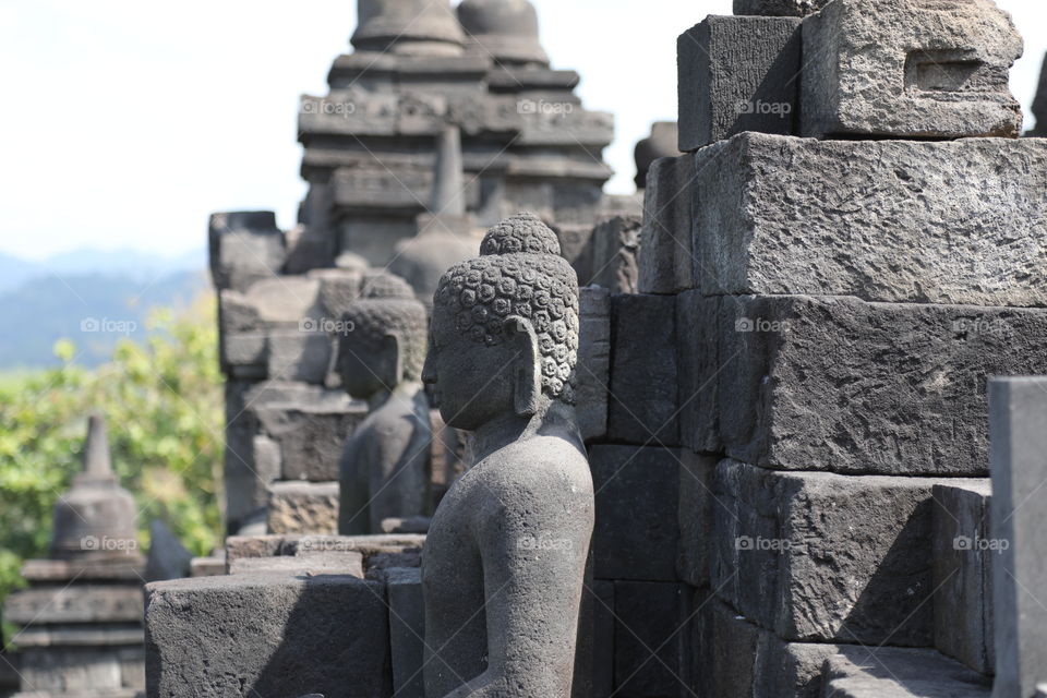 Buddha statues at the temple of Borobudur near Yogyakarta, Indonesia