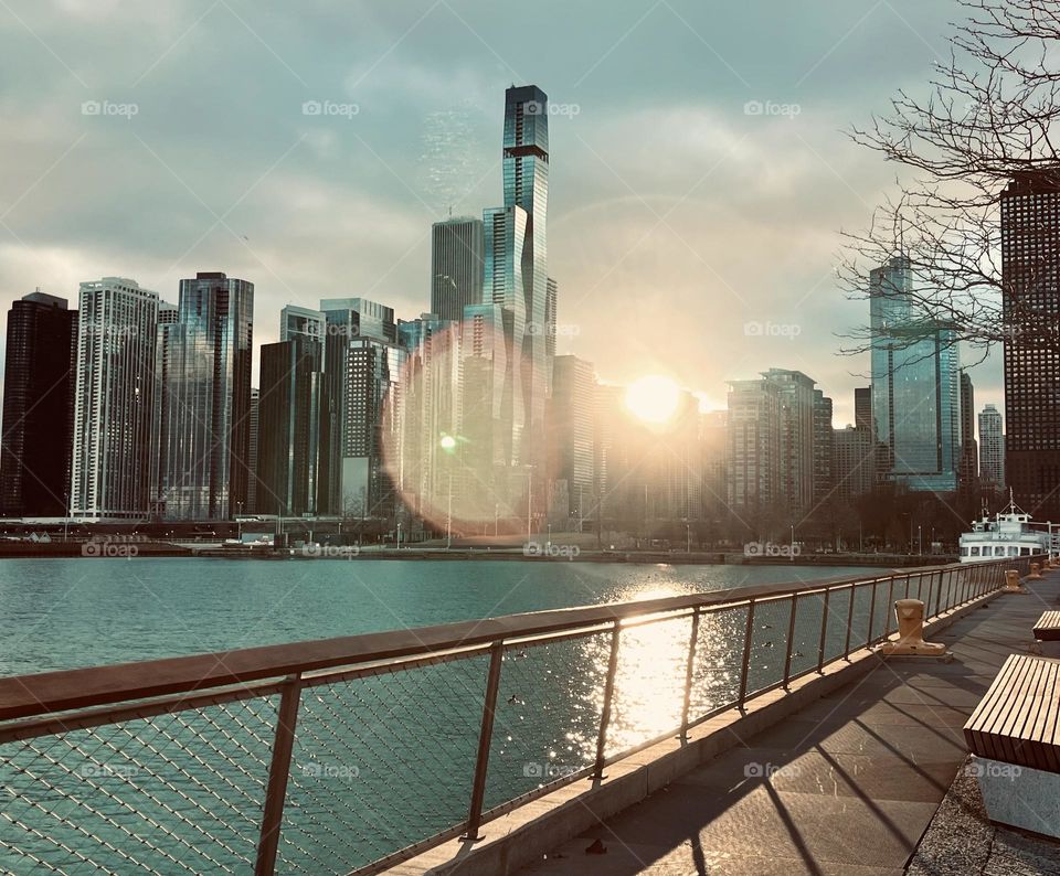 The city, sunset and water