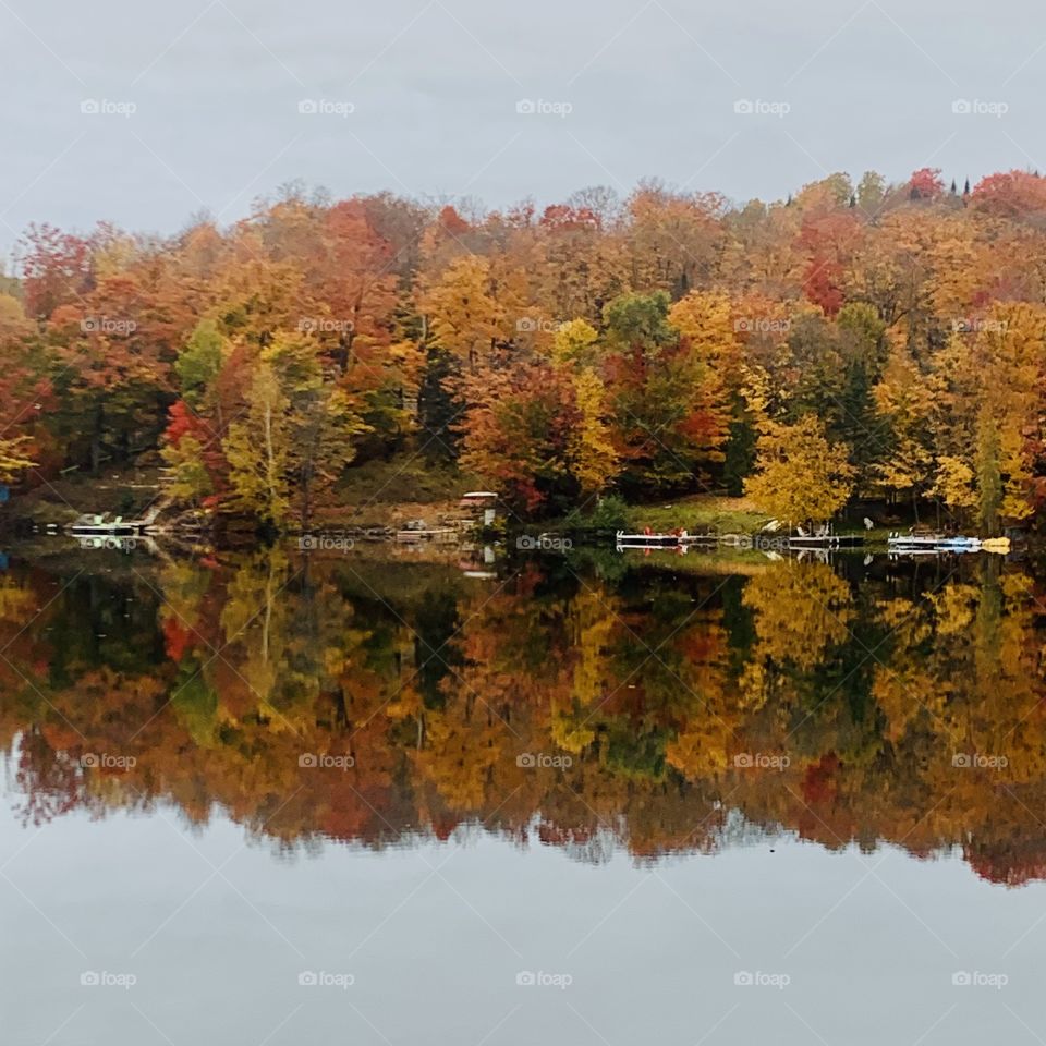 Fall on the lake in the Laurentians, Quebec, Canada 🍁