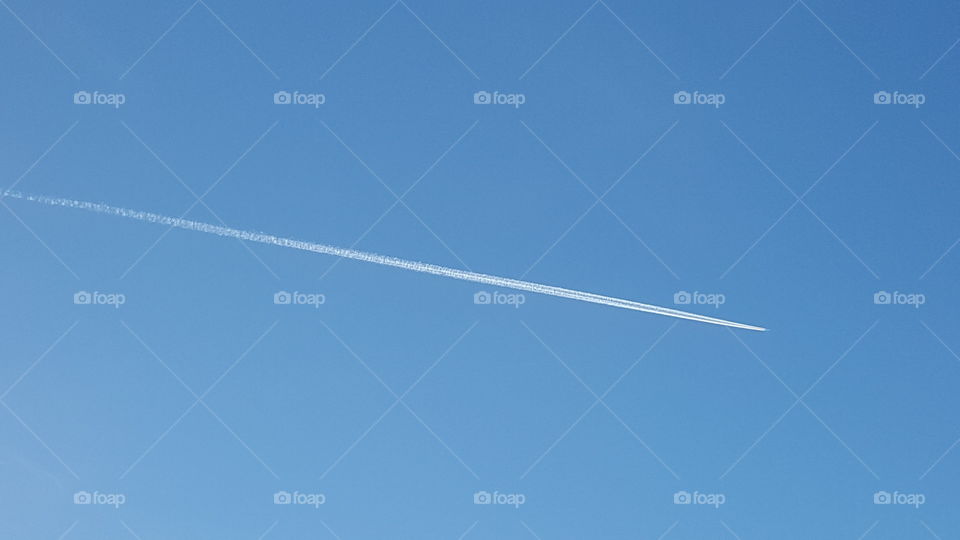 airplane high in the sky.