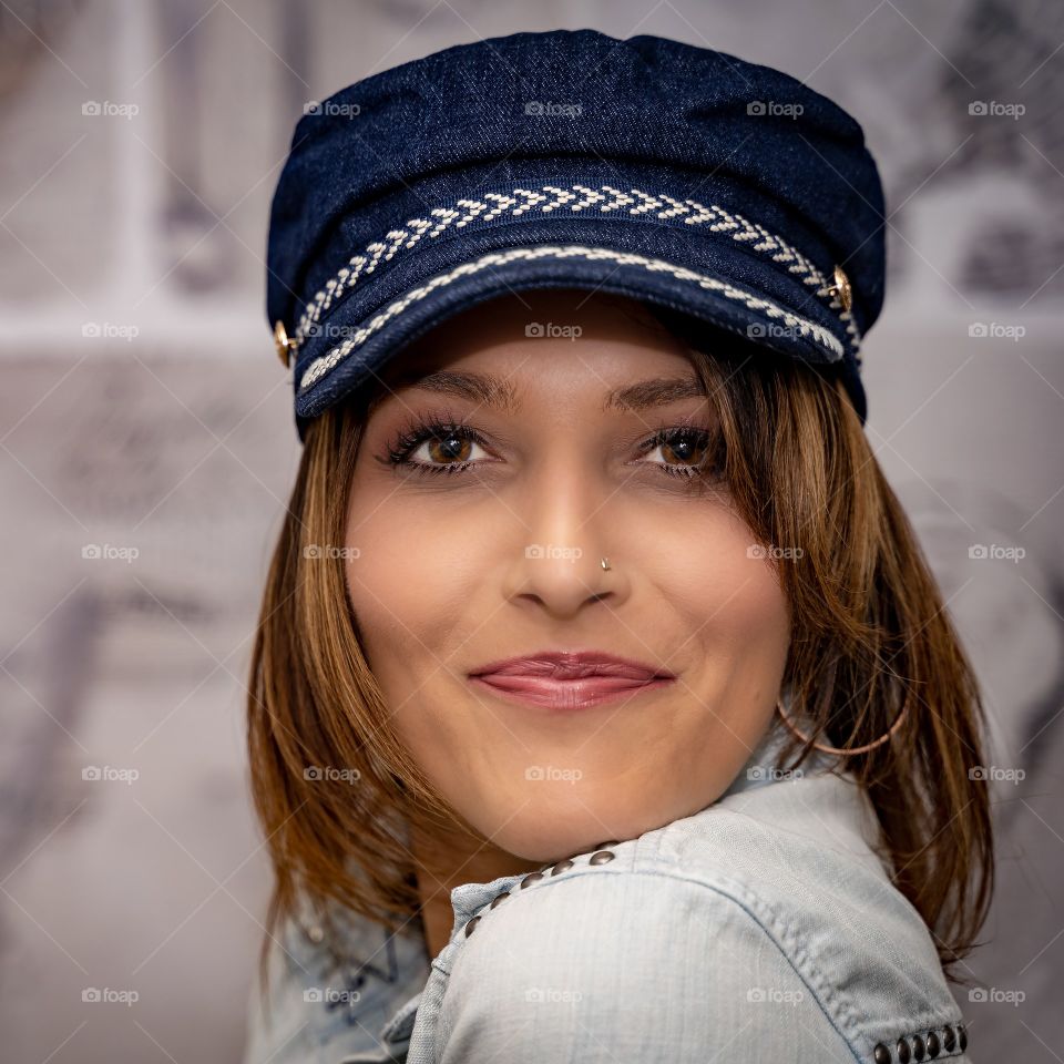Woman with a blue hat