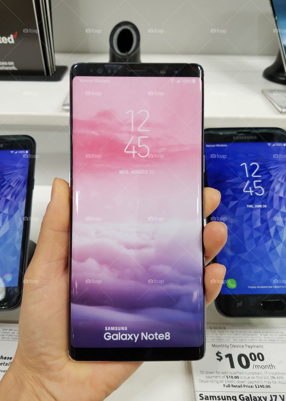 Holding Samsung Note 8