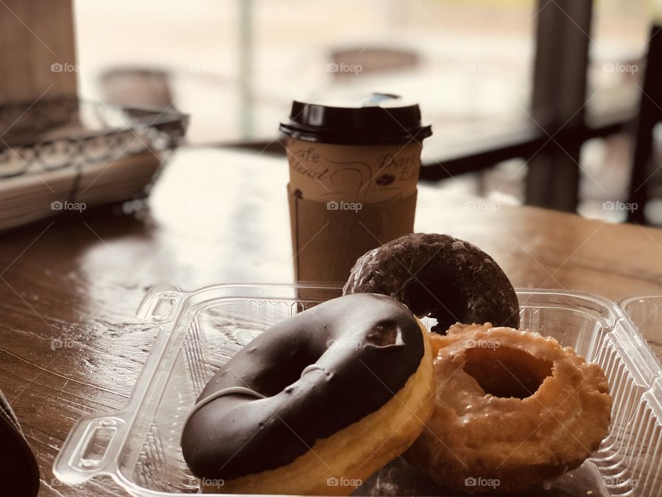 Coffee. Breakfast time.  Coffee and donuts.  Donuts   Cinnamon