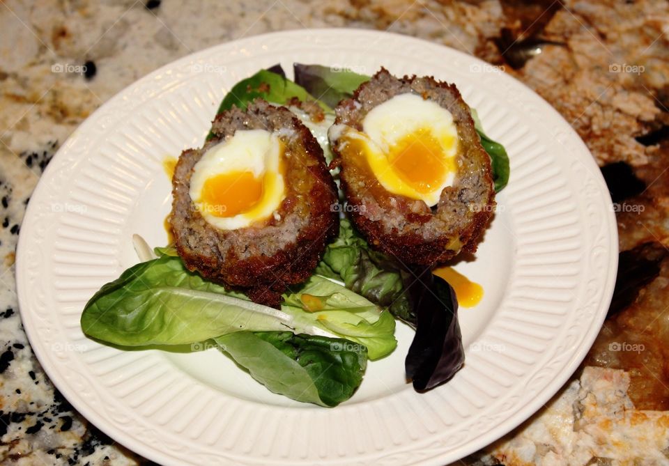 Scotch eggs sliced