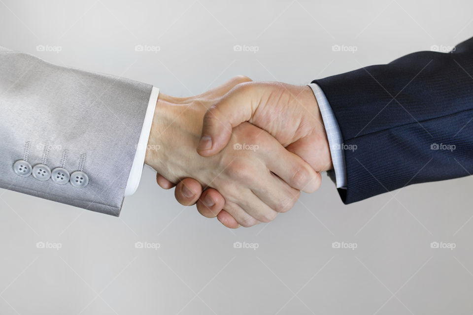 two men shaking hands