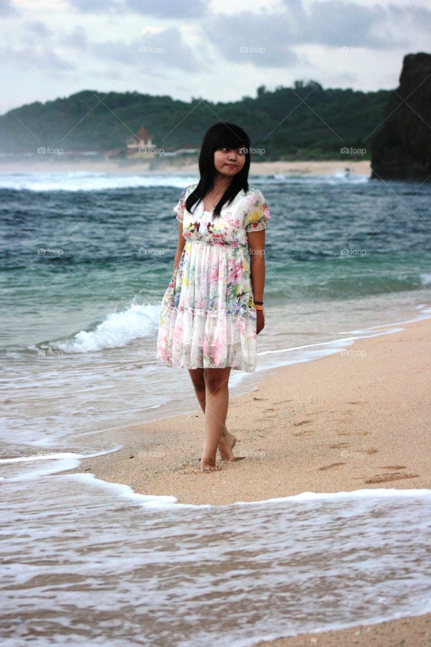 girl on the beach. girl on the sundak beach in white costum