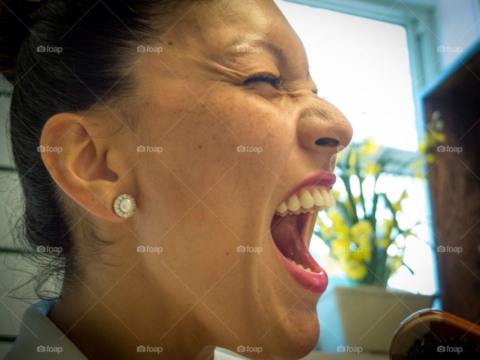 Woman sings passionately at Home