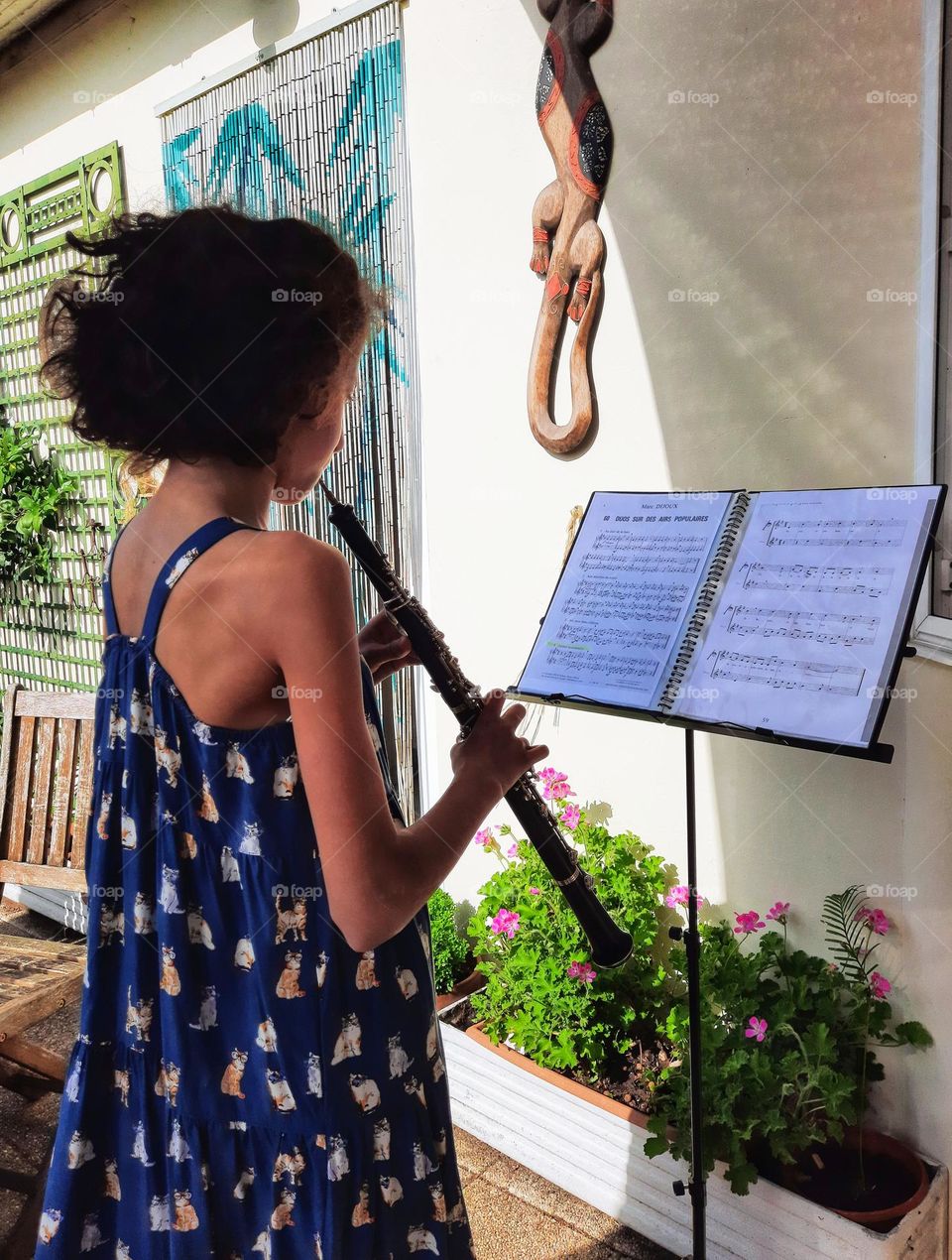 Young girl playing the clarinet