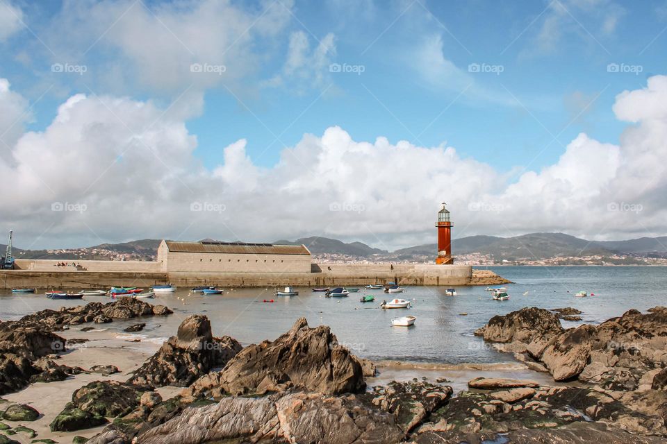 lighthouse in a harbour