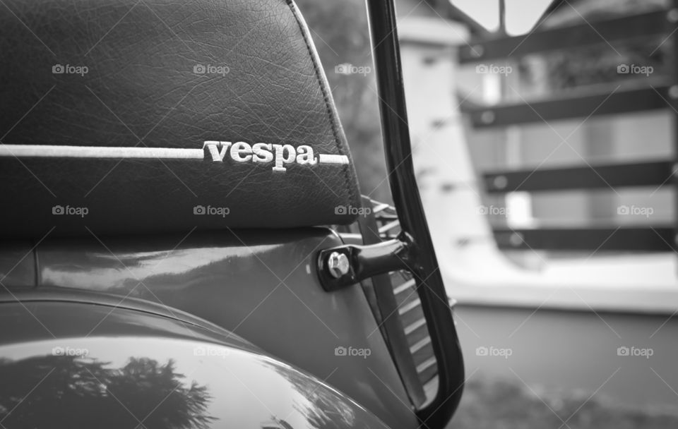 italian vespa motorcycle logo in black and white