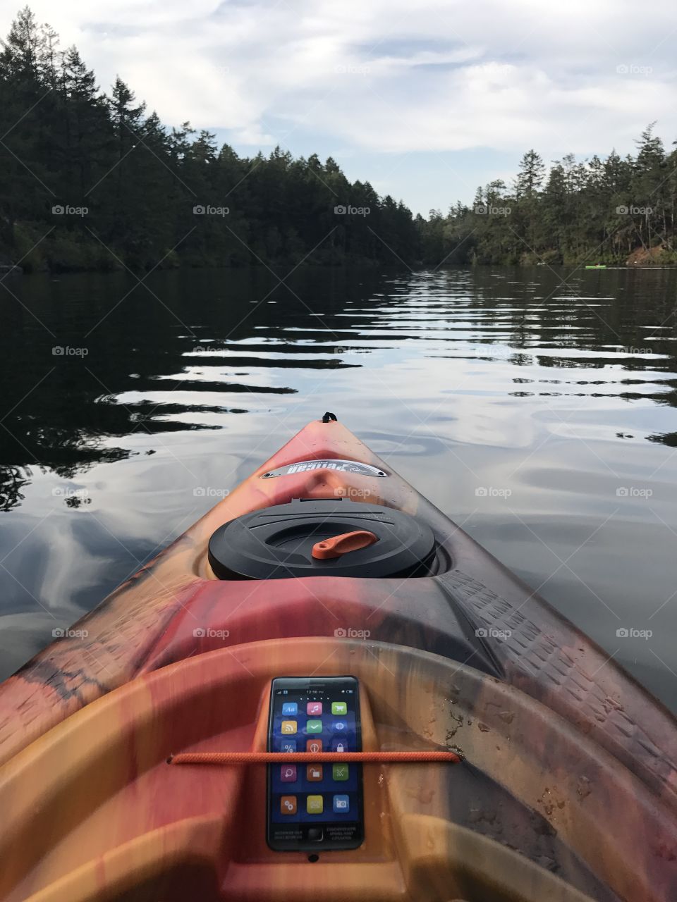 Looking ahead over lake from kayak. Ripples. 