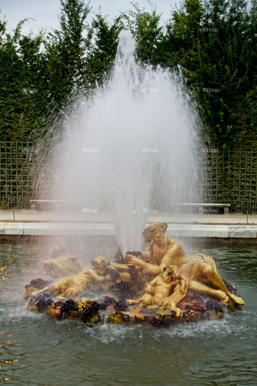 statue of a person in a garden