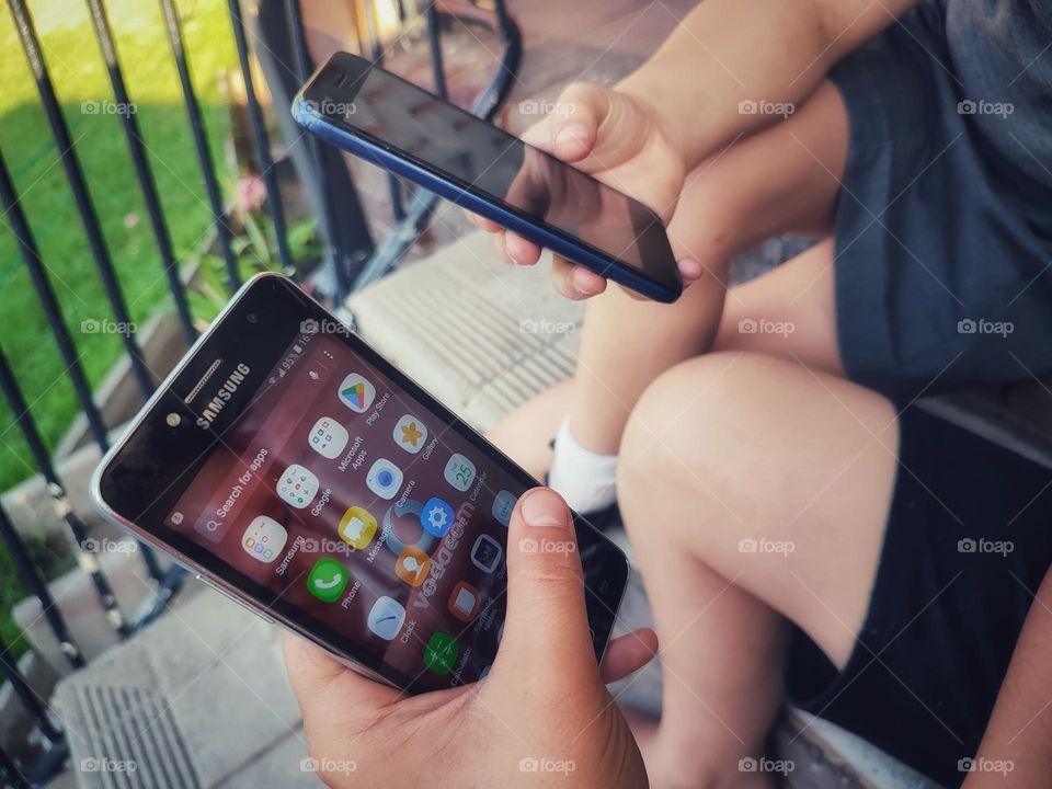 Young people on their phones