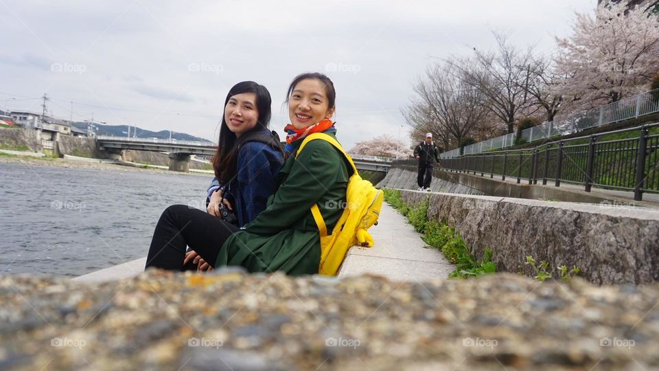 Me and my best friend traveling in Kyoto riverside 