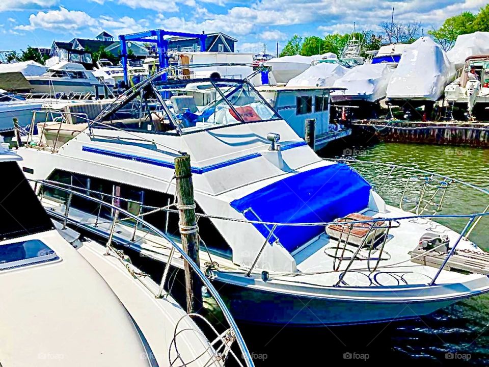 Boats in the Atlantic Ocean at a peer in Brooklyn, New York photographed in the summertime of 2020. Hypnotic Productions