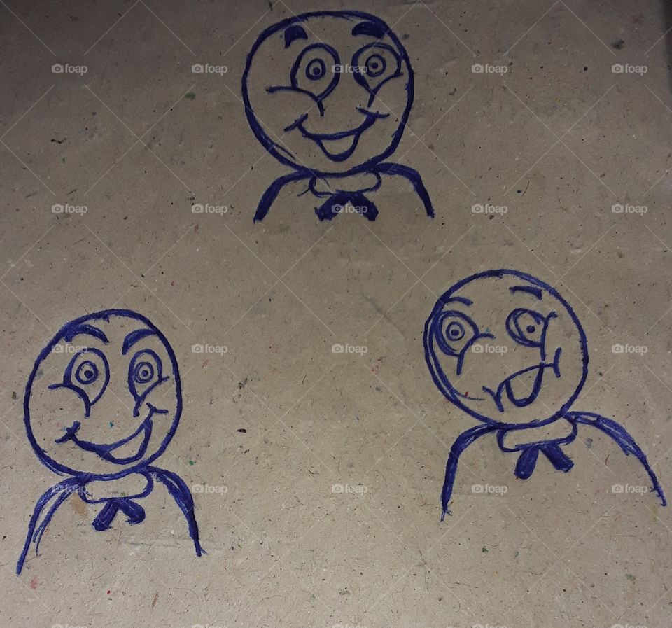 this is picture of three faces. the three faces are smile. background is white wallpaper.