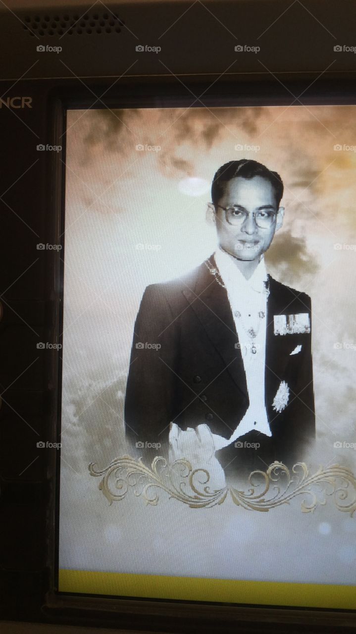 King Poomipol of Thailand in my heart. I took this photo out of an ATM when I was withdrawing some money. He is always in my heart.