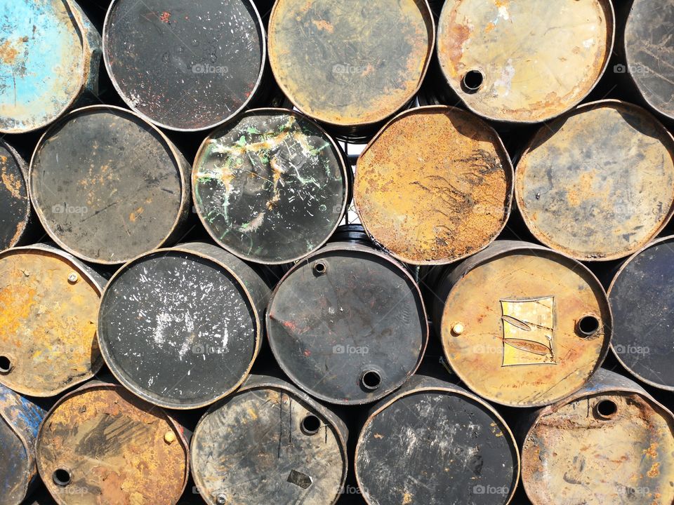 Full frame shot of metal barrels stack.
