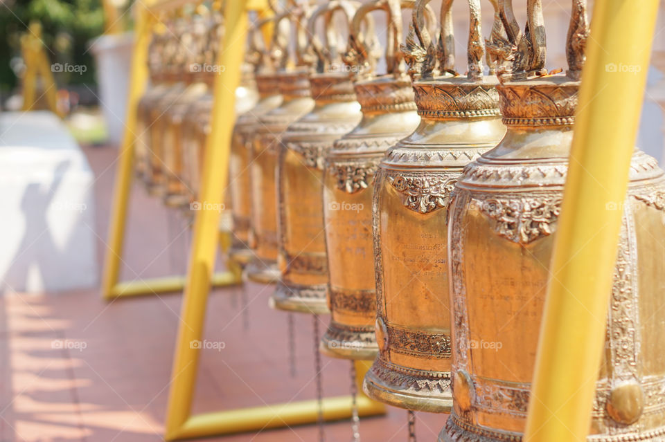 row of gold bell in Buddhist temple,Thailand