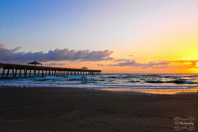 Juno Beach pier sunrise