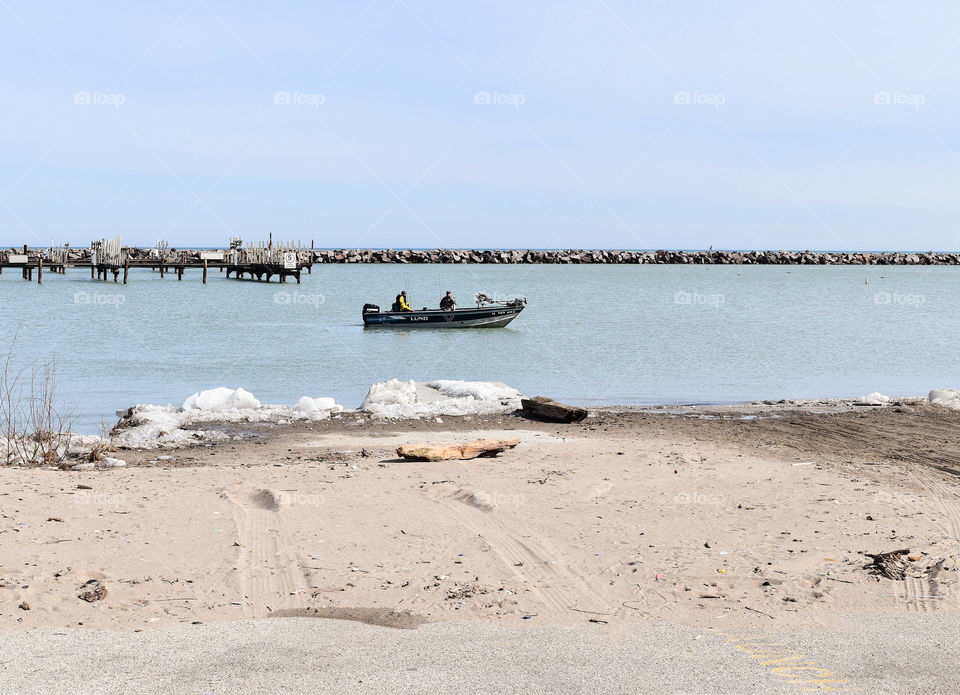 Men fishing in Lake Michigan